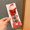 Detail of Christmas hair clips featuring plush Santa and festive pom-pom decorations - Santa Claus / Five-Piece Set