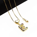 Detailed shot of golden heart and letter E pendant with vibrant colorful zircons - Pendant with Necklace / Letter E