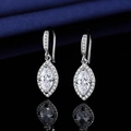 Sparkling S925 silver marquise-cut zircon drop earrings on a black reflective surface - Horse Eye Earrings Led-117