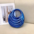 Elegant bright royal blue metallic handbag with unique spiral texture and circular handle - Blue