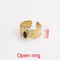 Golden open ring with oval black gemstone and embossed leaf textures on the band - Style 8-Relief Leaf Black Gem