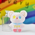 Détail d'un porte-clés ours en peluche rose avec des yeux en forme d'étoile - 12cm / Rose