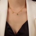 Gold plated titanium steel necklace with sun pendant, green gemstone and zircon accents - Gold (P1883)