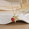 Gold-plated bird necklace featuring white zircon pavé and a large red gemstone pendant - FN0135 Deep Red Berry Bird