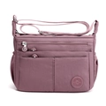 Bolso bandolera de nailon violeta con múltiples bolsillos y correa ajustable - Rosa carne