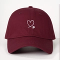 Classic wine red cotton baseball cap with white heart embroidery in center front view - One Size / Burgundy