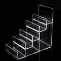 Five-tier clear acrylic display stand with tiered shelves and front lip for storage - 5-Tier / Clear