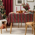 Christmas red and green plaid table runner with snowflake patterns on a dining table - Green Snowflake Plaid