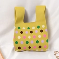 Knitted tote bag with colorful polka dots on a bright yellow base and dual handles - Rainbow Polka Dot Lemon Yellow