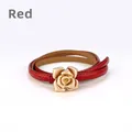 Slim red leather waist belt for women featuring a detailed gold rose metal buckle - Red / 105cm