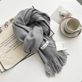 Elegant grey thick cashmere-feel scarf with tassels on a white minimalist background - Heather Grey
