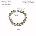 Detail eines 12mm Gold-Silber-Edelstahlperlenarmbands mit Größen- und Gewichtsangaben - 12mm / Gold und Silber Zweifarbig