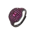 Detailed macro view of 18K gold plated ring with purple crystals on black metal band - Gun Black Rose Red Zircon