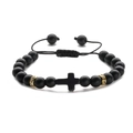 Detail of matte black beads bracelet with cross charm and gold rhinestone accents - Frosted