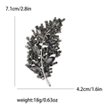 Silver leaf brooch with smoky grey crystals, dimensions 7.1cm x 4.2cm for size reference - Black