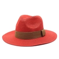 Detail van de weefstructuur van een rode Panama-strohoed met brede bruine lintband - Rood