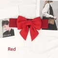 Elastic wide red cinch belt for women featuring a large decorative bow tie - 80cm Extended / Red