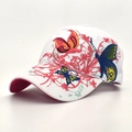 Detail of colorful butterfly and red vine embroidery on a white canvas baseball cap - M (56-58cm) / White
