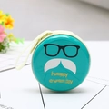 Round tinplate coin purse in cyan blue with happy everyday print and earphone storage - Mustache Glasses Blue Style 02
