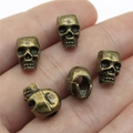 Totenkopf-Perlen im Vintage-Stil aus Bronze für Schmuckherstellung und Dreadlock-Haarschmuck - Antikbronze