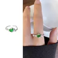 Minimalist 925 silver twig ring with irregular green gemstone in a polished finish - 491 Claw