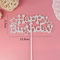 Silver glitter Happy Birthday cake topper with star details, measuring 12.8cm by 6.3cm - Star HB Silver