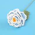Macro detail of hand-knitted blue and white gradient peony flower with texture - Blue