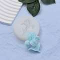 Macro detail of iris flower silicone mold with 3D floral resin casting on blue background - Iris Shape (2)