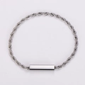Modern silver stainless steel twist chain bracelet with a polished rectangular pendant - Steel