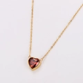Minimalist gold necklace featuring a heart-shaped red zircon pendant in a classic bezel setting - Gold / Red