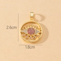 Detailed size view of a gold evil eye pendant with red and white stones, 2.6cm by 1.8cm - Gold Eye Shape Inlaid Red and White Gems Pendant (E)