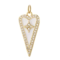Macro shot of gold heart pendant with inlaid white enamel and sparkling zircon accents - White Enamel Heart Pave