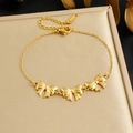 Elegantes goldenes Edelstahl-Gliederarmband mit Schleifen auf einer Geschenkbox - Schleifen-Stil (B1902) / Gold