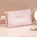 Pink PU leather travel cosmetic bag with zipper and Travel & Fashion text - Pink-Medium