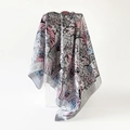Detail of silk satin scarf featuring colorful cartoon cat prints draped over a white stand - 90x90cm / Gray
