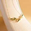 Elegant gold-tone antler necklace featuring sparkling green and white marquise zircons - XL1994 Branch Leaf Deer Horn Gold