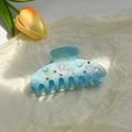 Detail of light blue acetate hair claw with gold glitter, stars and colorful rhinestones - Blue Rhinestone Claw Clip