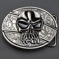 Western punk gunmetal skull belt buckle with detailed 3D relief and floral texture - Skull