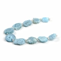 Irregular blue crystal tower beads made of natural stone on a clean white background - Tower Shape 12-28mm / Aqua