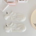 Socquettes blanches en coton avec broderie cartoon noire sur le talon arrière - Taille unique / Style de Figure Noire