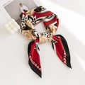 Elegant red black beige leopard print faux silk scarf tied in a stylish knot - Red