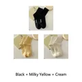 Three pairs of pastel cotton socks with hello print in black, yellow, and cream - 3 Pairs - Black + Milky Yellow + Cream