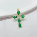 Gold-plated cross pendant with green teardrop zircons and center clear stone on white background - Green