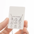 Silver 444 Angel Number hollow pendant necklace displayed on a white product card - Cutout 444 / Steel