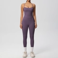 Detail view of purple high waist yoga set featuring compression leggings and strappy top - Eggplant Purple