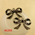 Vintage bronze alloy bow charm pendant with embossed metal texture for DIY jewelry making - A1255-29*18MM