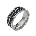 Close-up of a wide titanium ring with silver fleur-de-lis pattern and black enamel finish - Fleur-de-lis Style/Size 7