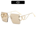 Rahmenlose quadratische Sonnenbrille in Tee-Verlauf mit goldenen Doppelherz-Bügeln - C2-Champagner