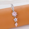 Silver belly button ring featuring pink zircon flower charms on brown leather - Classic Pendant (Silver Pink)