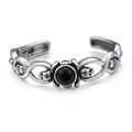 Gothic punk open cuff bracelet in silver steel featuring center black onyx and skulls - Black Gemstone Skull Style (KB99436-BD)
